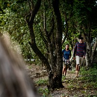 Couple trekking in a forest