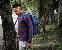 Man trekking in a forest