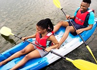 Couple canoeing in a lake