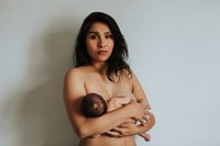 Mother holding her newborn baby