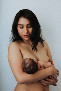 Mother breastfeeding her newborn baby