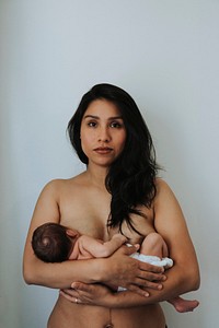 Mother breastfeeding her newborn baby