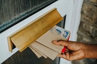 Woman picking up the mail