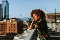 Girl with curly hair at a LA rooftop