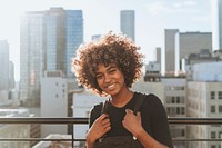 Girl with curly hair at a LA rooftop