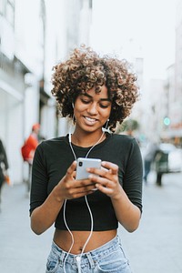 Girl listening to music from her phone