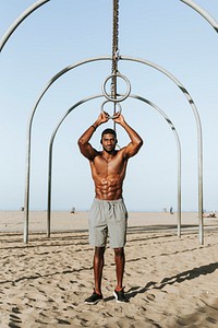 Fit man working out at the beach