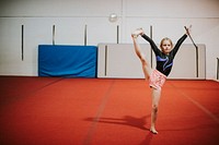 Young gymnast practicing a gymnastic