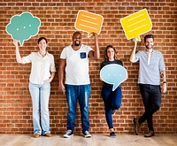 Diverse happy people holding speech bubble icons