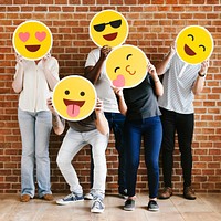 People holding positive emoticons