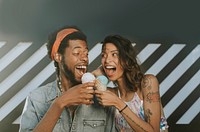 Cheerful couple enjoying ice cream