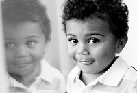 Black and white portrait of a preschool boy