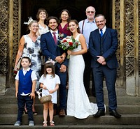 Bride and groom with their families