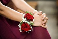 Bridesmaid with a rose corsage