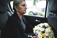 Sad widow on the way to th funeral