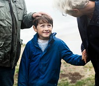 Happy boy enjoying with his grandparents