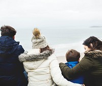 Happy family enjoying at the beach