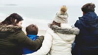 Happy family enjoying at the beach