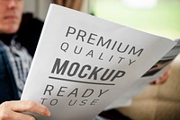 Man holding a premium quality paper mockup