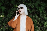 Albino girl busy talking on the phone