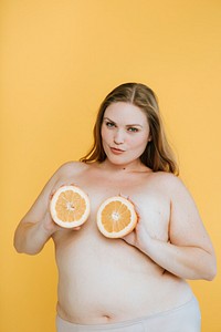 Confident plus size woman with fruit boobs