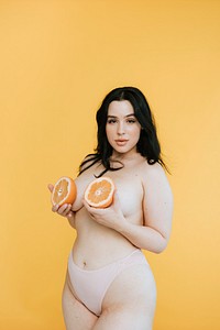 Beautiful woman with fruit boobs