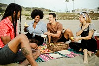 Friends having a picnic at the beach