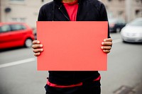 Person showing a blank board to support a movement