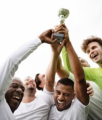 Soccer players team celebrating their victory