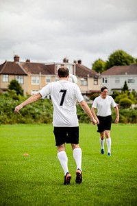 Male football players on a football pitch