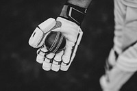 Cricket player holding a cricket ball