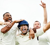 Cheerful cricketers celebrating their victory