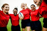 Cheerful rugby players celebrating their victory