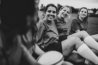 Young female rugby players after a match