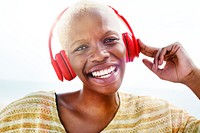 Cheerful woman listening to music with a headset