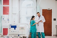 Doctor and nurse discussing a medical case