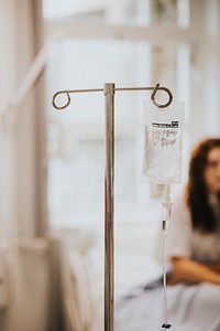 Patient receiving a drip through an IV