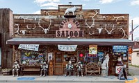 The distinctive White Wolf Saloon in Douglas, site of the annual Wyoming State Fair. The bar&#39;s owners, Diane and Carl Strode, who had lived in distant Miami, Florida, bought the closed establishment, bereft of fixtures, and gradually furnished it with colorful furnishings, Old West figures, and animal trophies and horns.