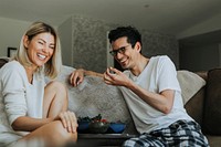 Woman laughing at her funny boyfriend