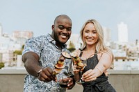 Happy couple enjoying a barbeque skewer and a glass of wine