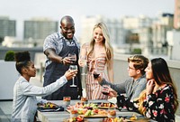 Gorgeous friends toasting at a summer party