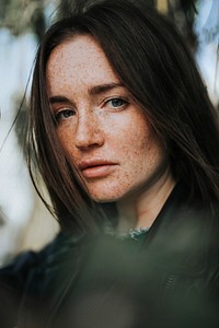 Portrait of a woman with freckles