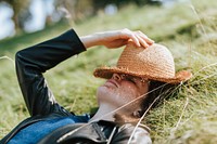 Woman taking a nap on the grass
