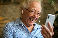 Cheerful senior woman making a video call