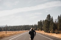 Man jogging on a countryside road