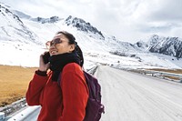 Traveler on the phone and the Himalaya mountains