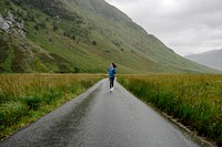 Female jogger in the Highlands