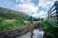Cyclists in Glen Etive, Scotland