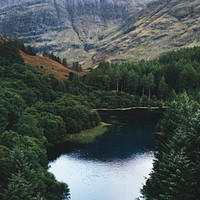 View of a dark river in the Scottish Highlands