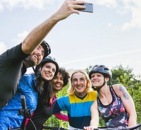 Group of cyclists taking a selfie in the nature